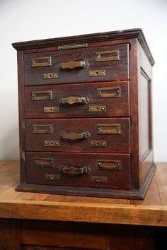 an old wooden chest with many drawers