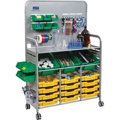 a metal cart filled with lots of different types of bottles and containers next to each other