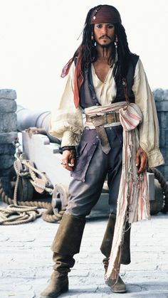 a man dressed as captain jack sparrow on the set of pirates