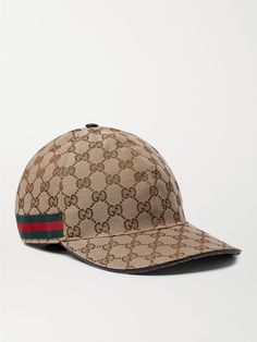 Gucci likes to reinvent itself every so often – think of the label's bold new logos and mascots from the animal kingdom, the interlocking 'GG' motif will always be the house trademark. This monogrammed canvas baseball cap has been made in Italy with signature striped webbing trims and a Velcro®-fastening leather back tab to adjust the fit. Gucci Hats, Gucci Cap, Italian Summer Outfits, Gucci Collection, Designer Jackets For Men, Dope Hats, Gucci Hat, Branded Caps, Hype Clothing