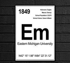 a black and white sign hanging on the side of a brick wall that says eastern michigan university