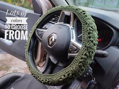 the steering wheel cover is knitted with green yarn