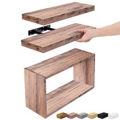 three wooden shelves are shown with different colors and sizes, one is made out of wood