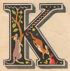 the letter k is decorated with kangaroos and trees