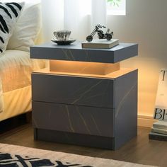 a night stand with two drawers on it