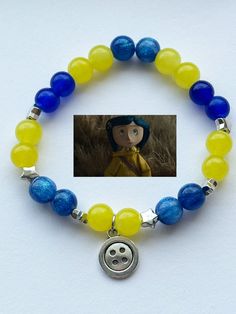 handmade beaded bracelets inspired by coraline Braclete Pattern Beads, Coraline Bracelet, Kandi Inspiration, Bracelets Kandi, Handmade Beaded Bracelets, Pony Bead Bracelets, String Bracelet Patterns, Coraline Jones, Kandi Bracelets