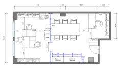 the floor plan for a kitchen and dining area with an island in the middle, two tables