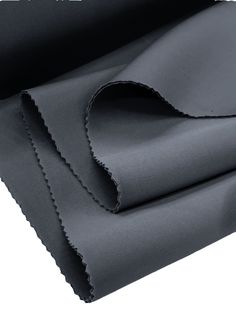 black fabric folded on top of each other