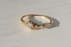 a close up of a ring on a white surface