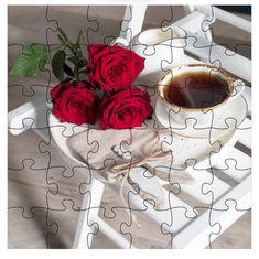 a puzzle with roses and a cup of coffee