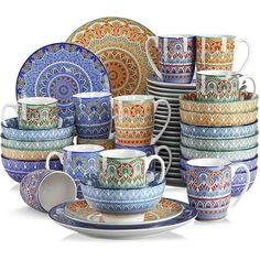 an assortment of colorful dishes and cups