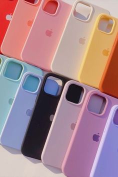 an iphone case is lined up in different colors