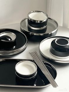 black and white dinner set with silver trimmings