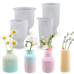 there are four vases with flowers in them on the white background, and one is empty