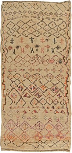 an old rug with many different designs on the bottom and sides, including geometric shapes