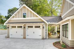 two garages are shown in front of the house