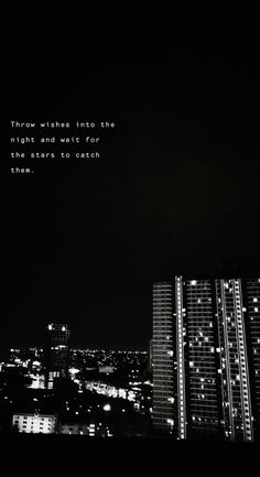 black and white photograph with city lights in the background that says, those wishes into the night are what's for us