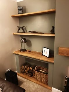 the shelves in this living room are made out of wood