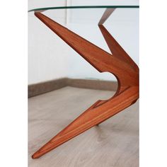 A coffee table known as spider, made by danish furniture manufacturer sika møbler in the 1960s.  the wooden structure is in solid teak.  the two sections of the base fit into each other and can be dismantled to facilitate storage.  the wooden base supports a circular glass top.  dimensions: w 105 x d 51 x h 55  epoque: 60s  designer: vladimir kagan  origin: denmark  restoration: the legs have been fully sanded and oiled to protect and feed the wood. I have official proof of authenticity such as Vladimir Kagan, Vintage Spider, Travertine Coffee Table, Wooden Structure, Oak Coffee Table, Brass Coffee Table, Teak Coffee Table, Danish Furniture, American Furniture