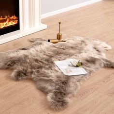 PRICES MAY VARY. Material: Made with high quality faux fur, 2.4-Inch-thick pile provides the fluffy touch and soft feeling. Size: Approx. 4 ft x 5 ft in reindeer skin shape, perfect size for home area rug add style to any room. Multi-use: Faux reindeer hide/skin fur item used as seat cushion over your armchair and sofa, throw rug for living room and bedroom floor. Gorgeous accent: Fluffy faux reindeer hide fur with soft ivory suede backing looks like brushed leather. Give your home a touch of lu Fur Rug Bedroom, Fur Rug Living Room, Reindeer Hide, Rug Fluffy, Fur Rugs, Faux Fur Area Rug, Carpet For Bedroom, Hunting Room, Fur Carpet