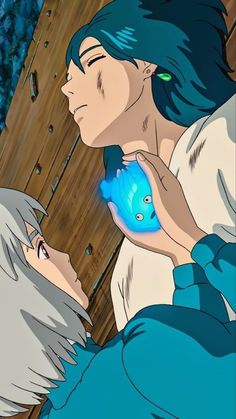 two anime characters one is holding a blue fish and the other is looking at it