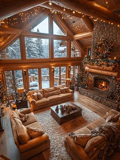 a living room filled with lots of furniture and a fire place in the middle of it