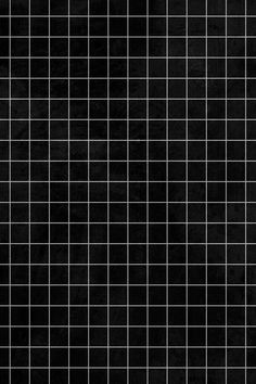 a black and white tiled wall with squares