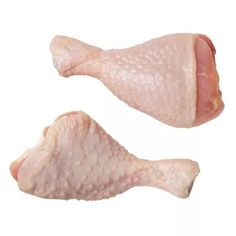 two pieces of raw chicken on a white background