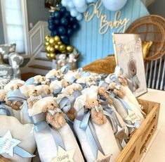 a basket filled with teddy bears sitting on top of a table