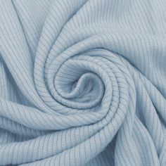 a close up view of a blue knit fabric