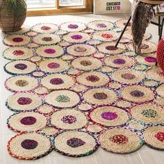 an area rug made out of crochet is shown in the middle of a room