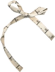 a measuring tape tied to the side of a headband with numbers on it,