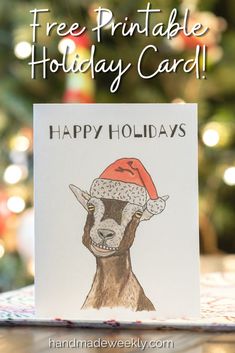 a christmas card with an image of a goat wearing a santa hat and the words free printable holiday card