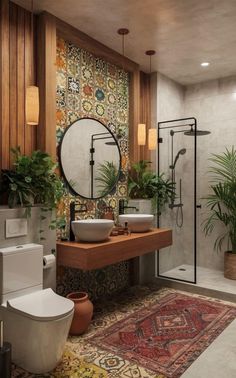 a bathroom with a sink, toilet and shower in the corner next to potted plants