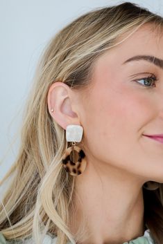 Show off your fun side with ease when you've got the Laura Acrylic Drop Earrings! These cute acrylic earrings feature an acrylic design with a stud post back! Style the Laura Earrings with any outfit to instantly upgrade your look! Available in 2 colors. Acrylic Stud Post Back One Size | Length 2.25” Trendy White Plastic Earrings, Trendy White Earrings, Trendy White Drop Clip-on Earrings, Acrylic Design, Tortoise Color, Ivory Earrings, Earrings Trendy, Upgrade Your Look, Acrylic Designs