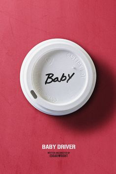 a paper plate with the words baby driver written in black ink on it, against a red background