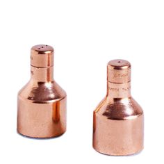 two copper colored bottles sitting side by side