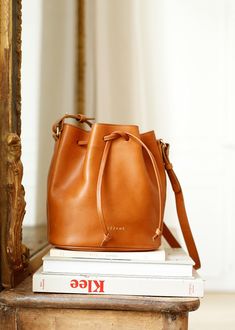 Bucket Bags Outfit, Photography Bags, Tan Cowhide, Capsule Outfits, French Girls, Leather Bags Handmade, One Bag, Leather Cleaning