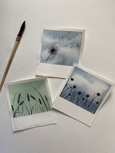 three watercolor paintings on paper with a brush next to one that has dandelions in it