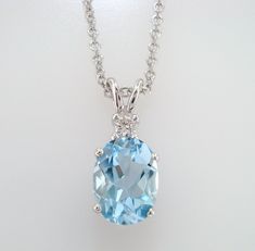 "HERE IS BEAUTIFUL HANDMADE PENDANT NECKLACE 14 KARAT WHITE GOLD COMES WITH 16\" OR 18\" INCH CHAIN CENTER AQUAMARINE IS 1.00Ct !! VERY SWEET AQUA COLOR & CLEAN AQUAMARINE CENTER SHAPE- OVAL CUT- GOOD CLARITY- AAA COLOR- AQUA CARAT- 1.00ct MEASUREMENT- 8X6mm 1 WHITE DIAMOND 0.04ct SI1 G COLOR TOTAL 1.04 CARAT VERY CLEAN AND BRIGHT WHITE COLOR DIAMONDS RETAIL PRICE IS OVER $2,700.00 COMES WITH $1,600.00 CERTIFIED APPRAISAL !! DREAM IT I\"LL MAKE IT SPECIAL ORDER WELCOME PLEASE VISIT MY ONLINE Handmade Pendant Necklace, Solitaire Pendant Necklace, Solitaire Pendant, Aqua Color, Handmade Pendant, Jewelry Maker, Schmuck Design, Handmade Pendants, Diamond Solitaire