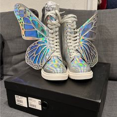 Brand New Beautiful Stunning Rainbow Butterfly Boots Wings Are Removeable Women Size 8 Sold Out Hard To Find In This Rainbow Holographic Color Wing May Arrive Foggy Due To Material But Could Be Always Wiped Off. Added Image Above To Show What The Fog Looks Like When It’s Not Wiped Trendy Flat Sneakers For Party, Trendy Flat Party Sneakers, Multicolor Sneakers For Spring Party, Designer Party Sneakers With Round Toe, Designer Round Toe Sneakers For Party, Winged Shoes, Butterfly Boots, Ball Outfit, Holographic Butterfly