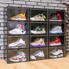 a wall mounted shoe rack filled with lots of shoes