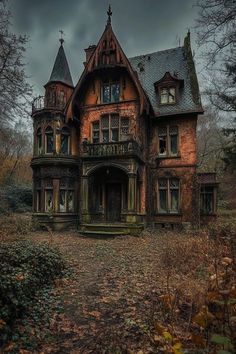 an old abandoned house in the woods on a gloomy day with dark clouds overhead