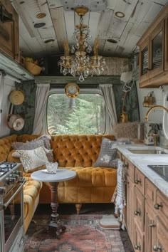 a kitchen and living room inside an rv