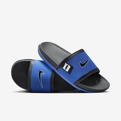 Rep the Blue Devils all the way down to your feet in these Duke slides. A cushioned synthetic leather strap features your school’s logo, while an innovative foam midsole makes this slide so comfy, you’ll never want to take it off. Nike Slides, School S, Duke Blue Devils, Shoes And Sandals, Blue Devil, S Logo, Plush Fabric, Take It Off, Way Down