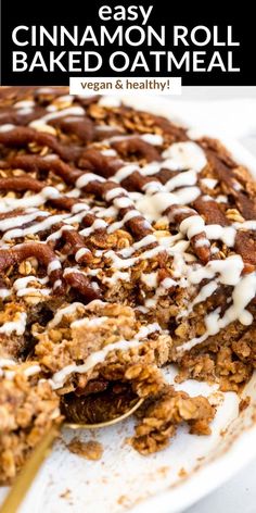 an easy cinnamon roll baked oatmeal on a white plate with a spoon