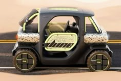 an electric car is driving on the road with its doors open and wheels still in place