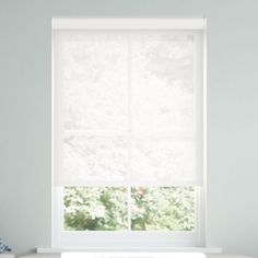 a white bath tub sitting next to a window