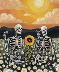 two skeletons sitting in a field with sunflowers