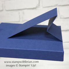 an open blue box sitting on top of a table